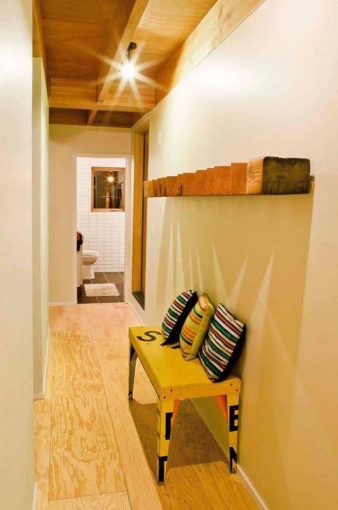 narrow-hallway-decorating-ideas-small-bench-and-cushions-700x1054